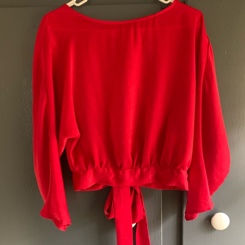 Beautiful rich red 100% polyester top by JACK by BB Dakota. Tie up in the back